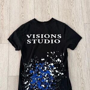 Visions Studio Black Tee with Blue and White Design